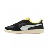 Championes Puma Palermo Ferrari, color negro con detalles en amarillo y blanco.