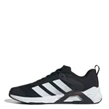 Championes Adidas negros con detalles plateados y suela blanca.