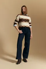 Jean wide leg de tiro medio color negro, confeccionado en denim cotton spandex.