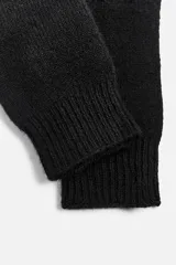 Guantes tejidos de punto en hilatura de lana y cashmere color marrón.