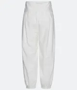 Pantalón aladín blanco de algodón con cintura ancha y puños elásticos.