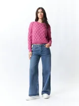 Sweater tramado de manga larga y cuello a la base, color fucsia.