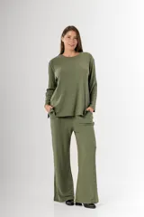 Pantalón palazzo verde oliva de morley de vara ancha en algodón y viscosa, con bolsillos y cintura elastizada.