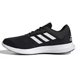 Championes Adidas Coreracer negros con las tres tiras blancas en el lateral.