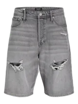 Short de jean gris con roturas en ambas piernas, corte holgado y tiro alto.