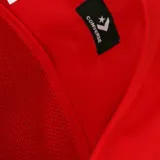 Mochila negra Converse All Star University con logo circular de la marca en blanco y azul.