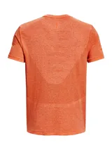 Remera deportiva gris jaspeado de corte clásico, con cuello redondo y mangas cortas. Confeccionada con tejido de punto transpirable y tecnología seamless para mayor comodidad.