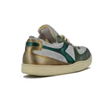 Championes Diadora modelo Mi Basket Row Cut Metal Pigskin Used, color beige con detalles en verde y gris.