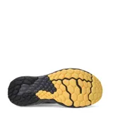 Championes de running New Balance Evoz V4, color negro con suela color caramelo.