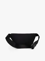 Riñonera o cangurera de color gris oscuro, confeccionada en poliuretano, con correa ajustable y cierre de hebilla. Presenta un compartimento principal con cremallera y un bolsillo exterior frontal con solapa.