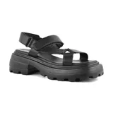 Sandalias negras de cuero sintético, con plataforma track y tiras anchas con ajuste de velcro.