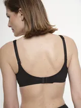 Soutien blanco de microfibra sin aro ni relleno, con breteles regulables.