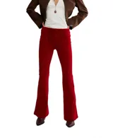 Pantalón acampanado de terciopelo color verde oscuro, con textura acanalada dispuesta en patrón chevron.