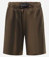Bermuda de hombre color marrón oscuro con efecto lavado (dirty washed), corte baggy y cintura elástica ajustable con cordón negro.