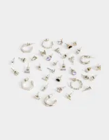 Set de 18 pares de aros dorados con diferentes diseños: strass, argollas, flores, flecha, infinito, mariposa, corazón y rayo.
