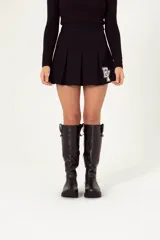 Botas altas de cuero negro con suela de 3 cm, fabricadas artesanalmente.