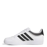 Championes Adidas Hoops 4.0 de caña baja, color blanco con tres tiras negras en los laterales y detalles en gris en el talón.