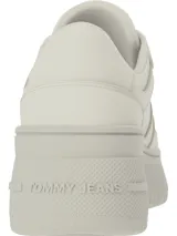 Zapatillas deportivas Tommy Jeans color crema, con plataforma gruesa y logo de la marca en el lateral.