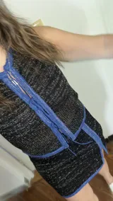 Chaleco tejido calado negro con lurex.