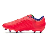 Championes de fútbol Under Armour Magnetico Pro 3 FG, color coral con detalles en verde y azul.
