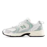 Championes New Balance 530 unisex, color blanco con detalles en plateado y verde agua.