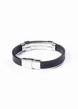 Pulsera de goma negra con aplique central de acero inoxidable labrado con diseño geométrico griego.