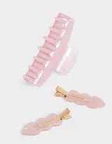 Set de accesorios para el pelo color rosa claro, que incluye un broche curvo y dos hebillas con forma ondulada, todos de acrílico.