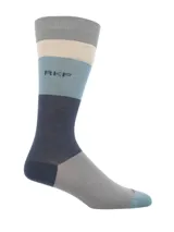 Calcetines largos con diseño de bloques de color gris, beige, celeste y azul. Confeccionados en bamboo y spandex. Talle 40-44.8