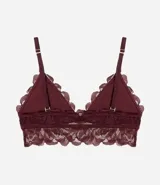 Soutien de encaje floral color crema, modelo top, con breteles finos ajustables y relleno triangular.