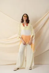 Pantalón palazzo de gasa color marrón con lazo en la cintura.