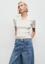 Jeans de mujer, tiro medio, color azul medio, con diseño balloon (holgado y ancho) y confeccionados en algodón.