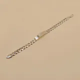 Pulsera de plata 925 con eslabones tipo cadena y placa rectangular central para grabar.