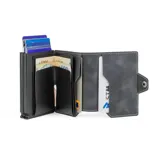 Billetera doble de cuero marrón con detalles en rosa. Cuenta con doble caja de aluminio con sistema de deslizamiento para tarjetas, clip para billetes y espacio adicional para documentos.