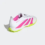 Championes de fútbol Adidas Predator League para pasto sintético, color blanco con franjas laterales en rosa vibrante y detalles en amarillo neón. Presentan una lengüeta plegable y suela con tapones cortos de caucho.