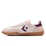 Championes Converse Run Star Trainer, color rosa pálido con detalles en morado y suela de goma marrón.