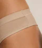 Pack de tres bombachas tipo bikini de microfibra, color blanco, negro y beige.