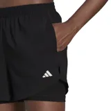 Short de running Adidas Aeroready Minimal 2 en 1 para mujer, color negro con logo blanco. Cuenta con short interior de compresión y tecnología Aeroready para absorción de la humedad.