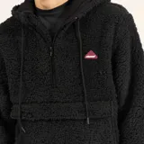 Canguro de polar negro con capucha, cierre parcial con cremallera, bolsillo tipo canguro con solapa y logo de Billabong bordado en el pecho.