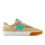 Zapatillas de skate New Balance Numeric modelo 306, color beige con detalles en turquesa, blanco y marrón. Confeccionadas en gamuza y material sintético, con logo "N" en los laterales y suela de goma.