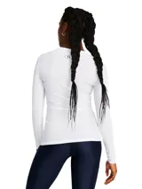 Remera deportiva Under Armour HeatGear Compression de manga larga, color negro con logo blanco en el pecho.