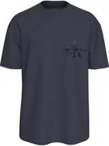 Remera azul marino de corte holgado con cuello redondo y mangas cortas. Presenta un logo de Calvin Klein Jeans en el pecho.