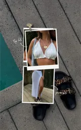 Conjunto de top halter a rayas horizontales marrones y blancas, y pollera larga blanca de hilo calado con tajo lateral.