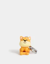 Llavero de silicona con forma de perro Shiba Inu color naranja.