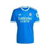 Camiseta de fútbol Adidas del Real Madrid, tercera equipación temporada 25/26. Diseño azul con detalles en blanco, cuello redondo y corte entallado.
