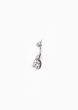 Piercing para ombligo de titanio con dos circonias redondas engarzadas.