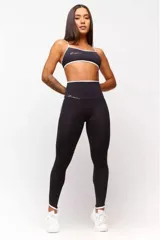 Calza larga deportiva azul marino con cintura alta y detalles en blanco en la cintura y laterales.