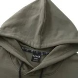 Buzo con capucha color ladrillo, con cordones negros y logo Hurley estampado en el frente.