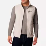 Chaleco de polar Columbia Fast Trek para hombre, color azul marino con cierre y detalles en azul eléctrico. Cuenta con cuello alto, bolsillos laterales con cierre y bolsillo en el pecho con cierre.