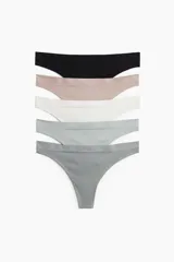 Pack de 5 colaless de punto en colores negro, beige, blanco, celeste y gris. Diseñadas con un número mínimo de costuras para una sensación más cómoda y suave. Modelo de cintura estándar con refuerzo interior.