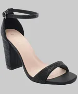 Sandalias negras de fiesta con pulsera al tobillo y taco bloque alto con apliques brillantes.